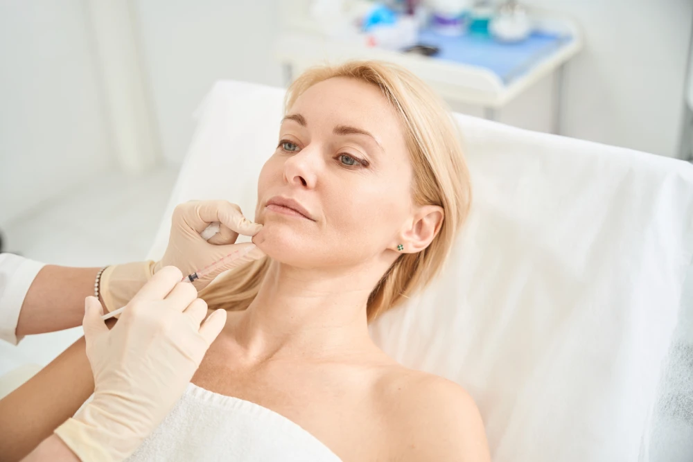 Botox injection being administered in a medspa setting.